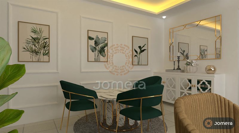 3D render of a dining nook with emerald velvet chairs on gold frames around a round marble table, botanical prints in wall mouldings and a gold-trimmed mirror over a fretwork sideboard